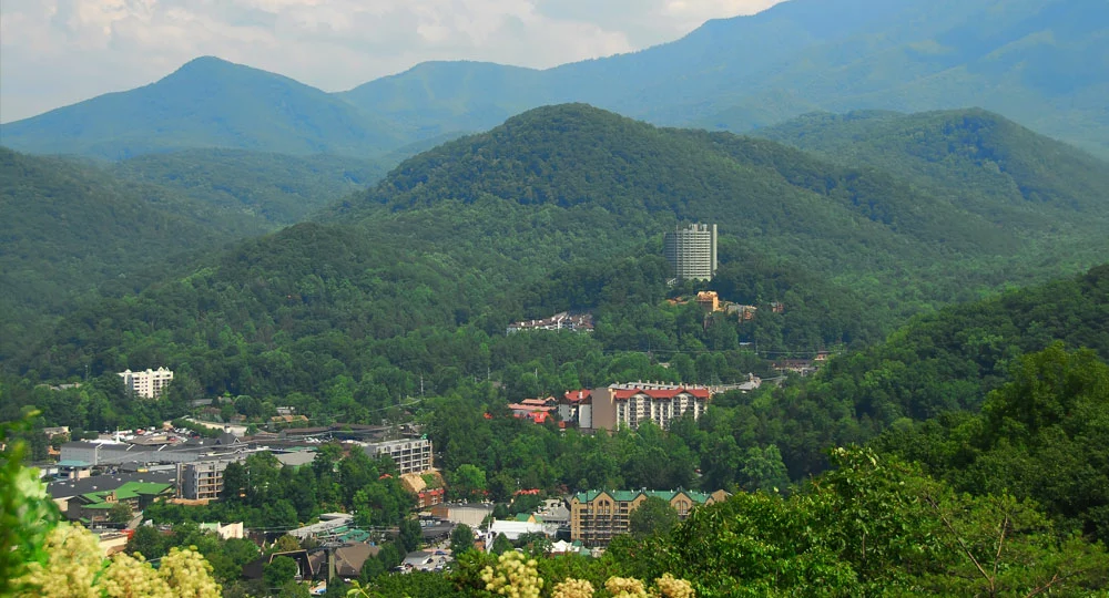 view of downtown Gatlinburg and surrounding Smoky Mountains