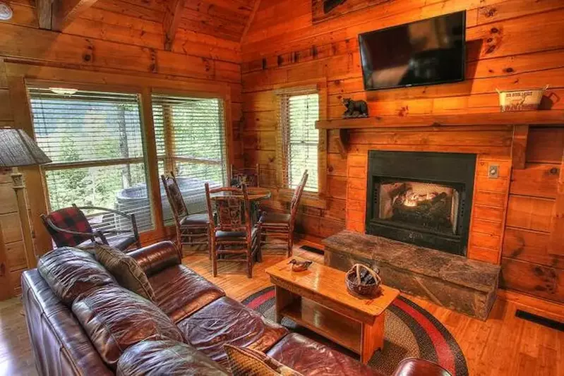 living room with fireplace in Gatlinburg cabin