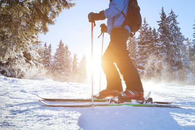 man skiing on snow