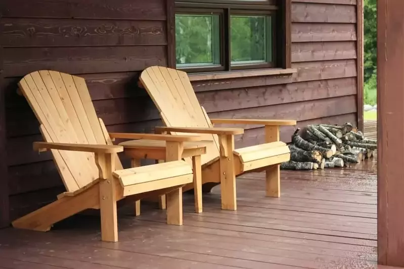 Chairs on the porch of a cabin