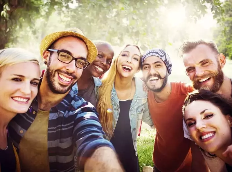 group of friends taking selfie while on a vacation in Gatlinburg