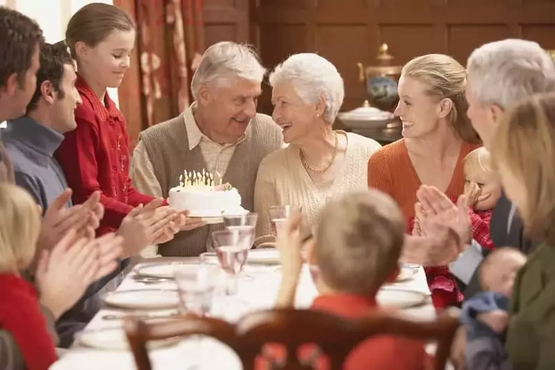 Grandparents with family celebrating anniversary at a large Gatlinburg cabin rental