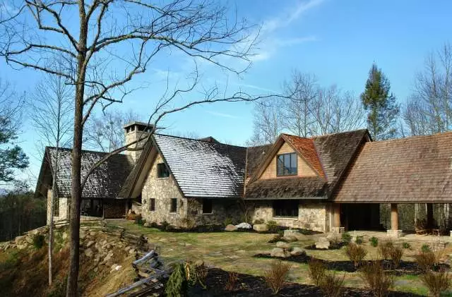 snow dusting the roof of a large cabin rental in Gatlinburg TN