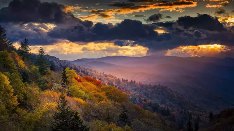 Sun shining through clouds over the Smoky Mountains