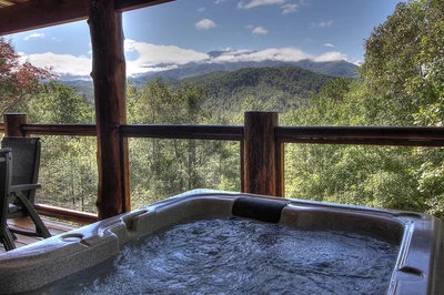 hot tub and view at enchanted view which is one of our inexpensive Gatlinburg cabins