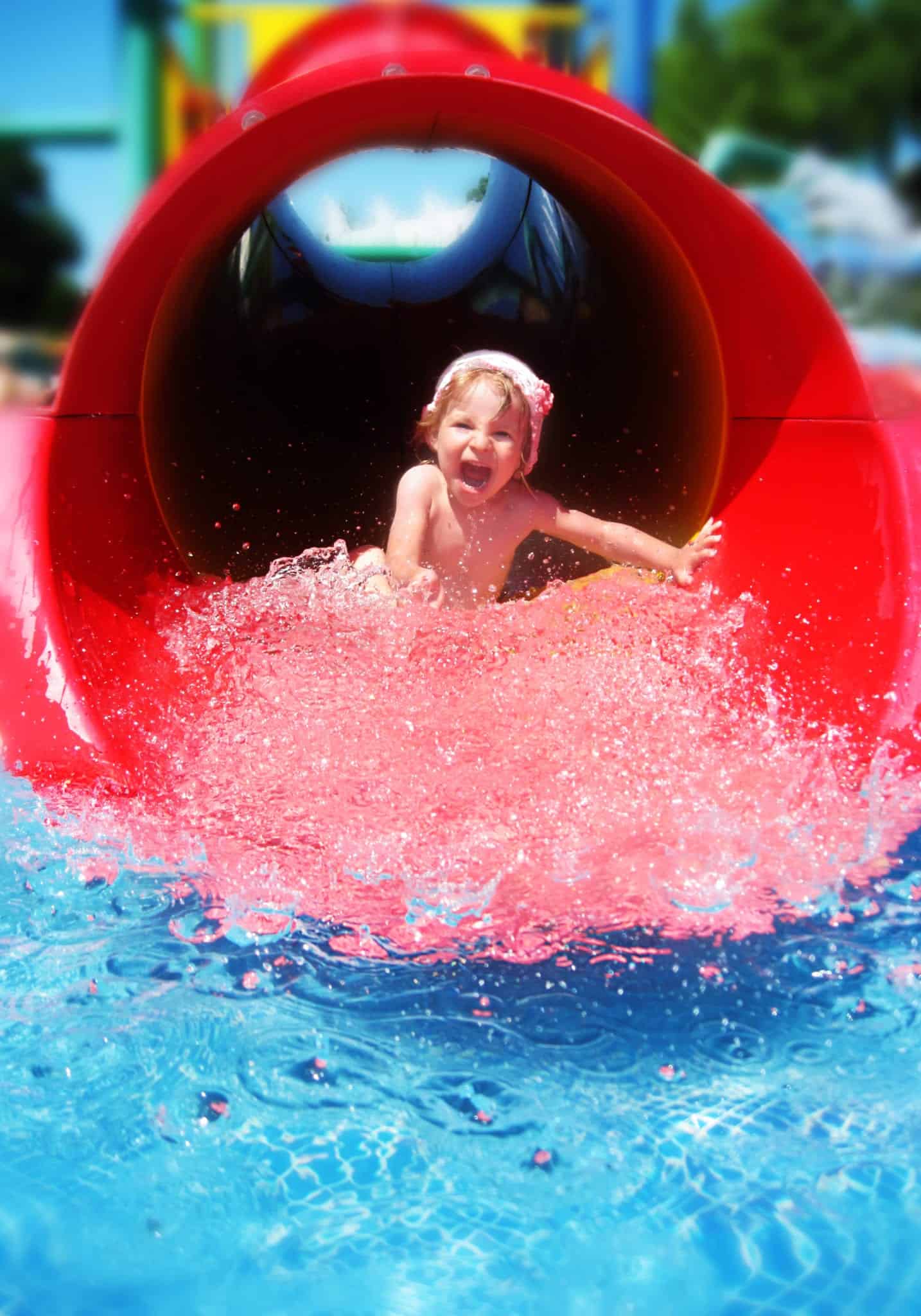 child on red water slide in Pigeon Forge TN