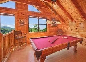 game room with pool table in a Gatlinburg cabin rental