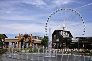 the island in pigeon forge with ole smoky and the great smoky mountain wheel in the background