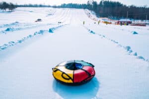 snow tube at the top of a tubing hill