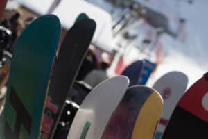 snowboards in stand